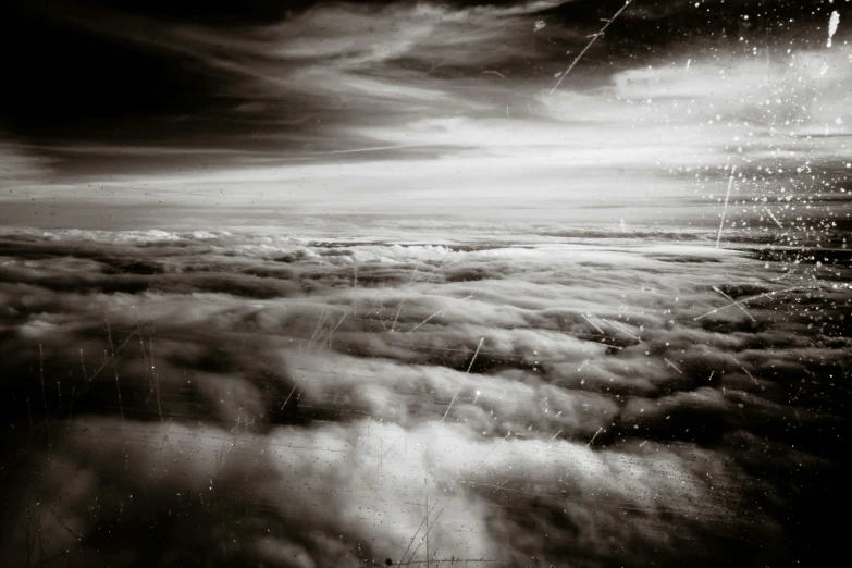 an aerial view of clouds in the air