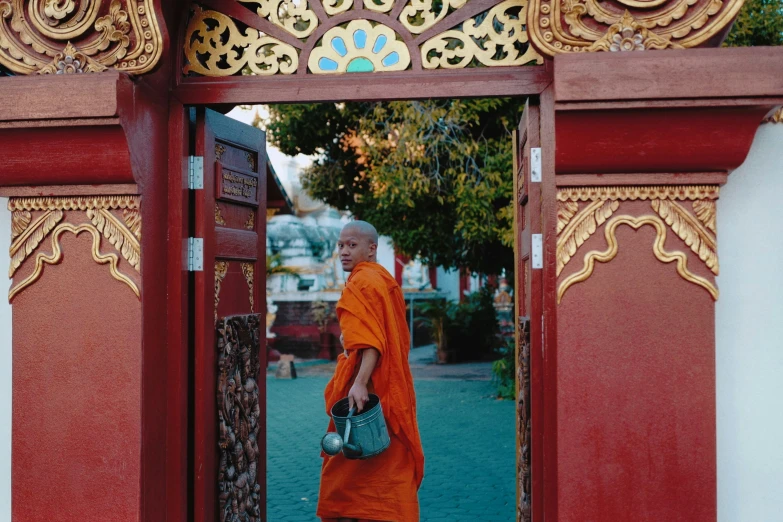 the monk has taken his place in the shrine