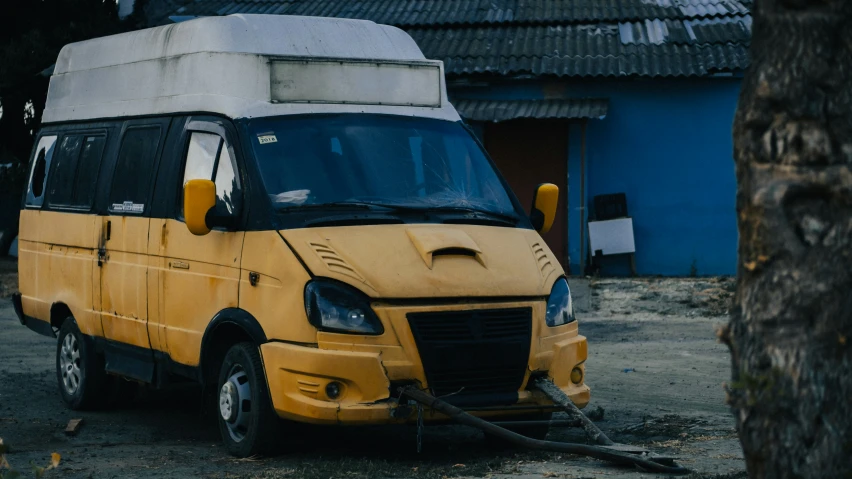an image of a small van parked with it's front wheels still in position