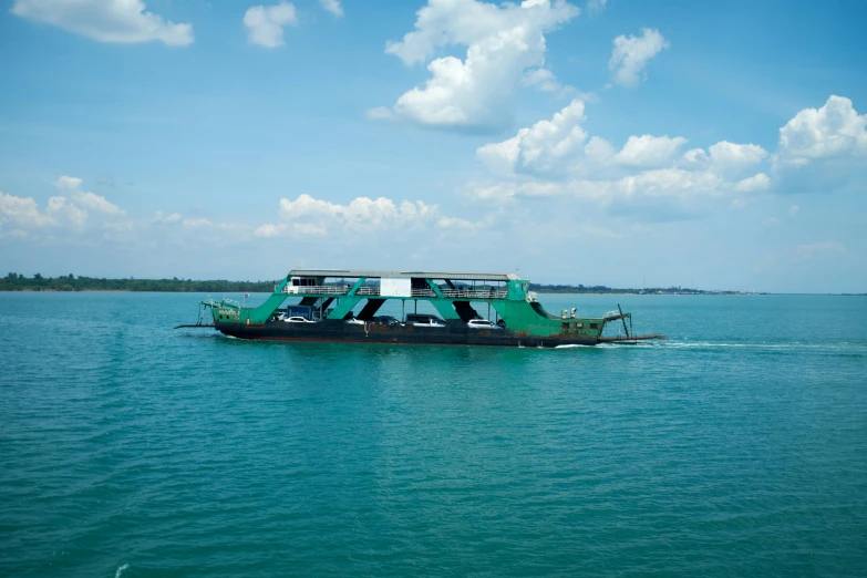 a large boat traveling across a big body of water