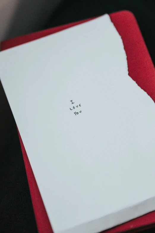 a picture of a piece of paper that has a small face