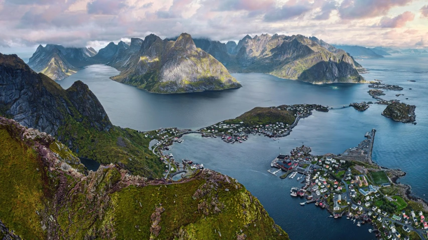 a view of a very large body of water next to a mountain