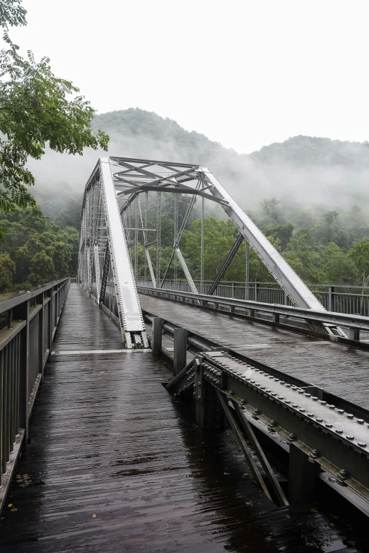 a train trestle suspended over a large body of water