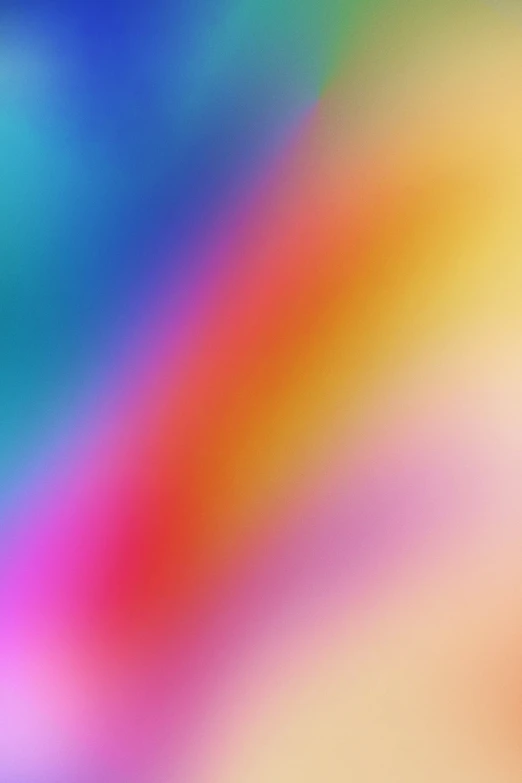 a blurred image of different colored shapes