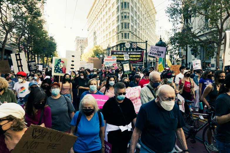 a large group of people on a city street