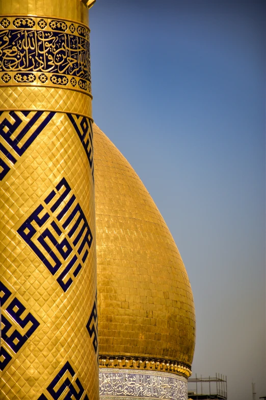 the golden domed building has oriental writing on it