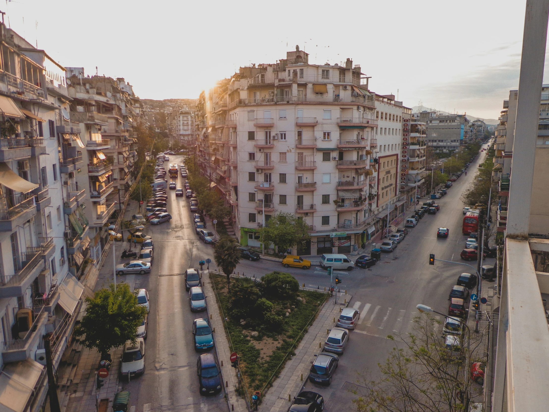 a city filled with cars and tall buildings