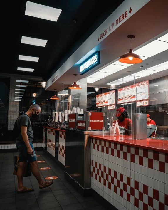 a man waiting to take his order at the diner