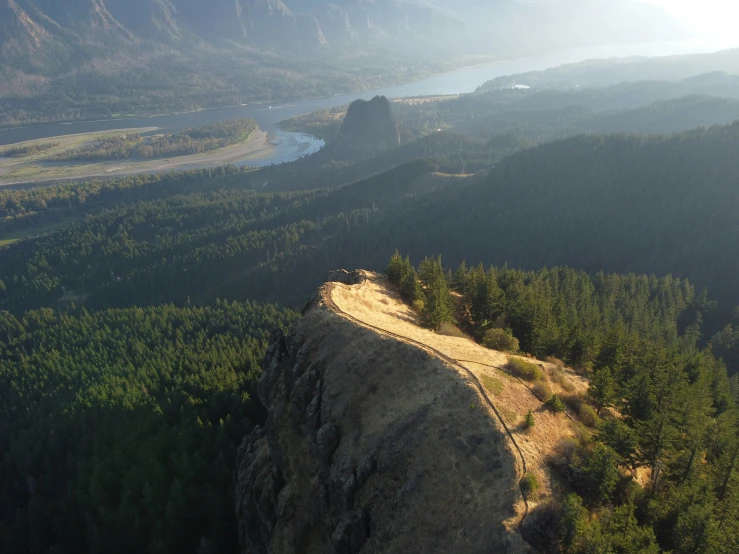 a person riding on the side of a cliff