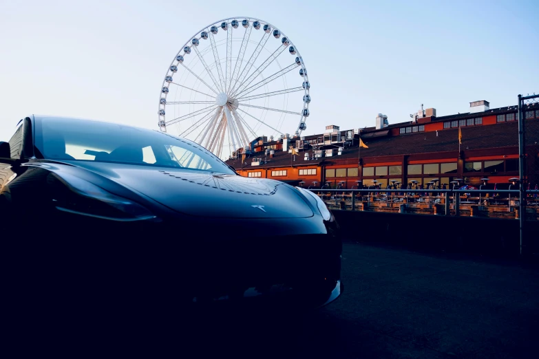 a car with a ferris wheel on top of it