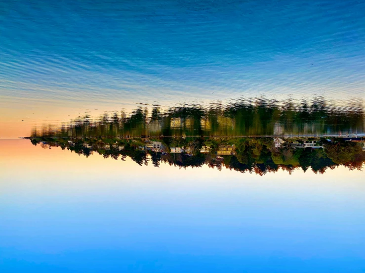 a scenic scene shows houses on the water