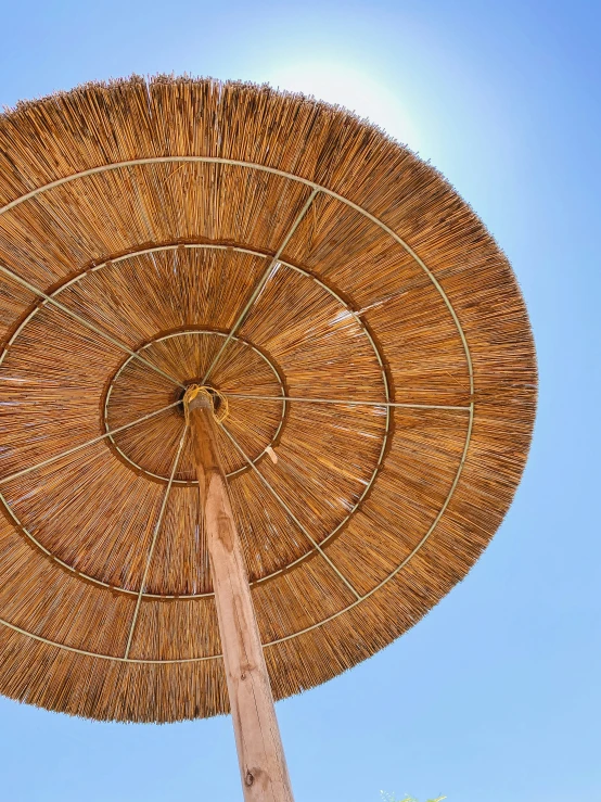 an umbrella sitting in the middle of the air