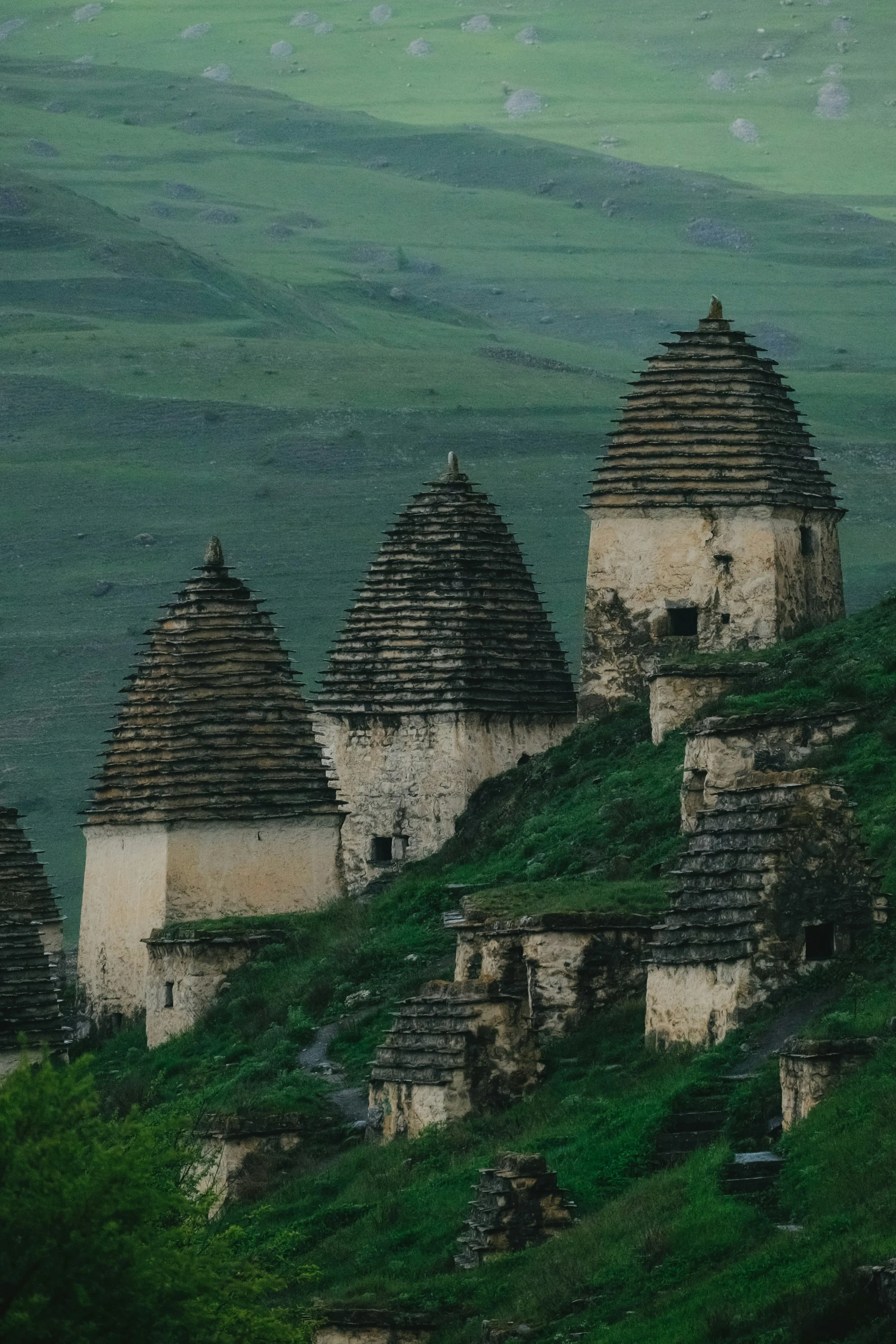 several old building on top of a hill