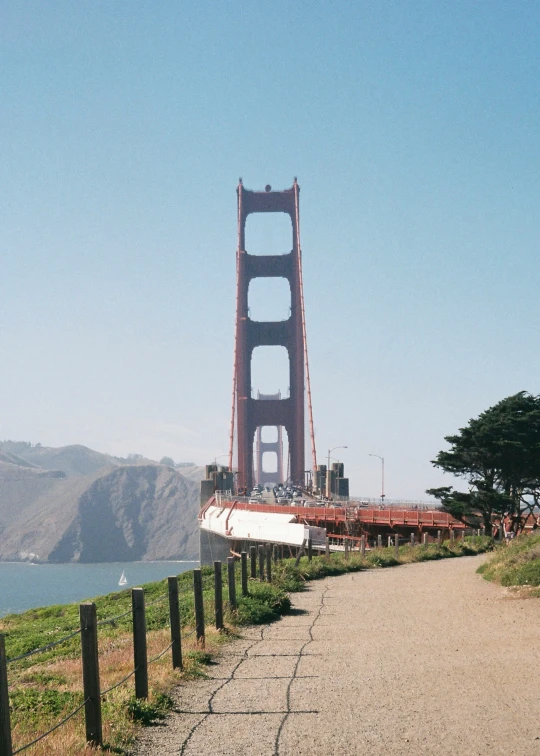 a view of the golden gate bridge with traffic