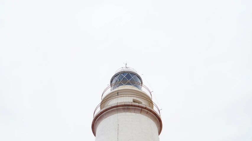 there is a light house that is located on top of a building