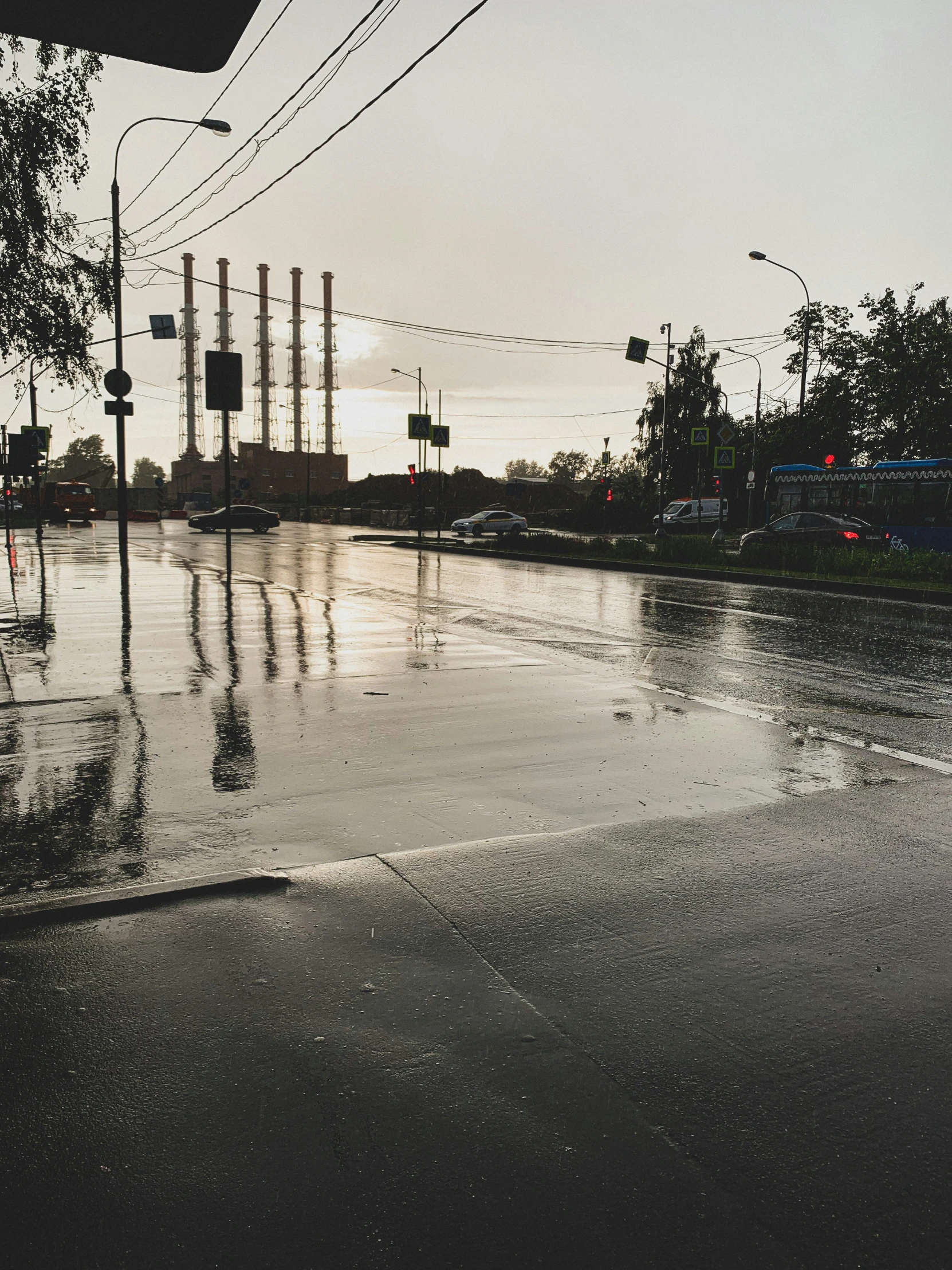 an intersection in the middle of a rainy day