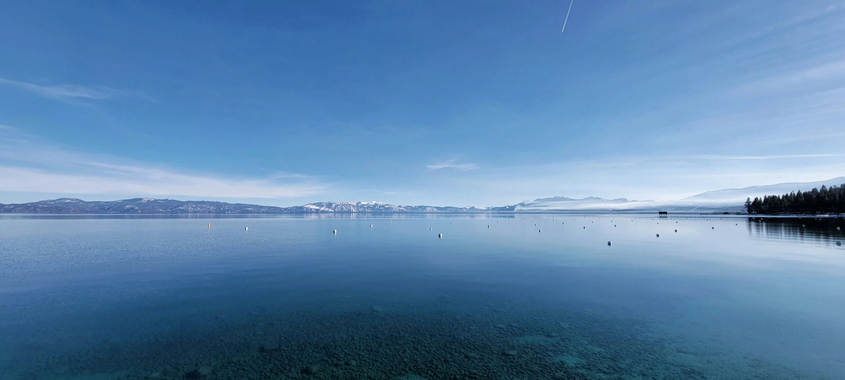 a large lake that is surrounded by mountains