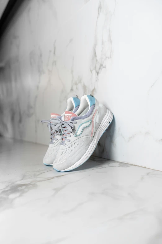 a pair of shoes sits on a counter top