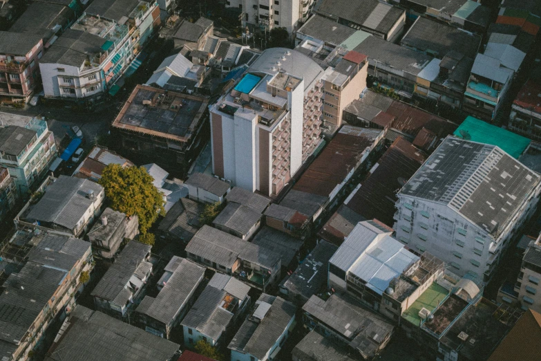 a city from above has houses and a clock tower