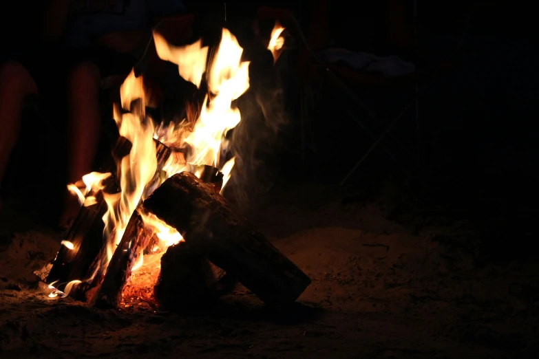 a fire with bright, glowing fire flames next to it