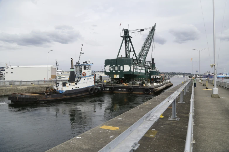 large fishing ships parked next to the river