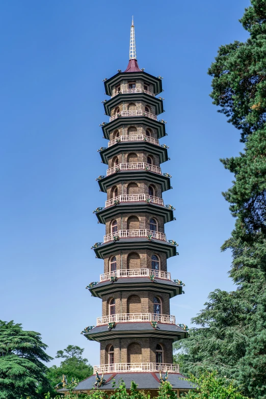 a tall building in the middle of some water