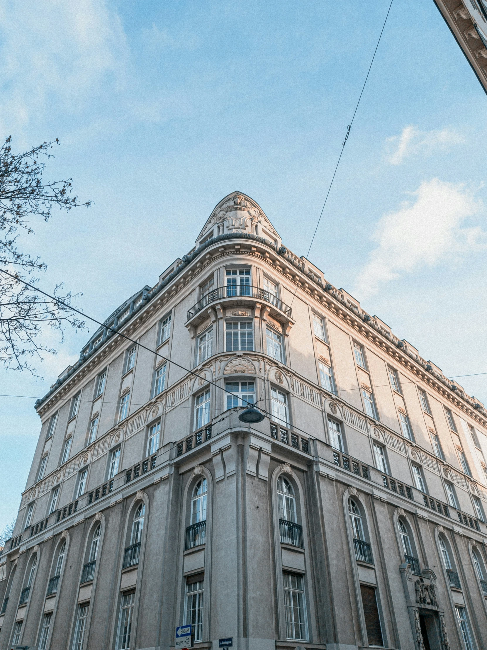 the corner of a building with a street light on it