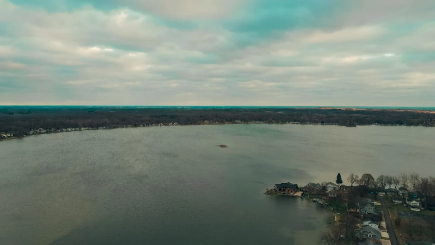 a body of water surrounded by a forest