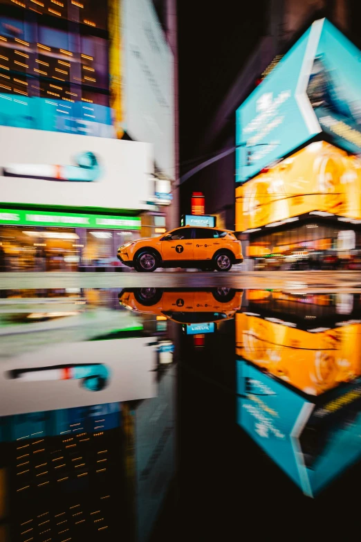 a yellow taxi cab is parked on the side of the street