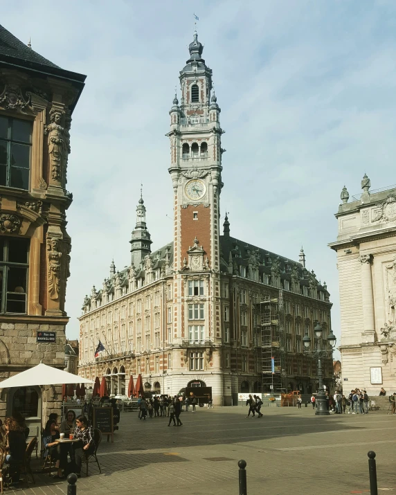 a tall building with a clock tower on top