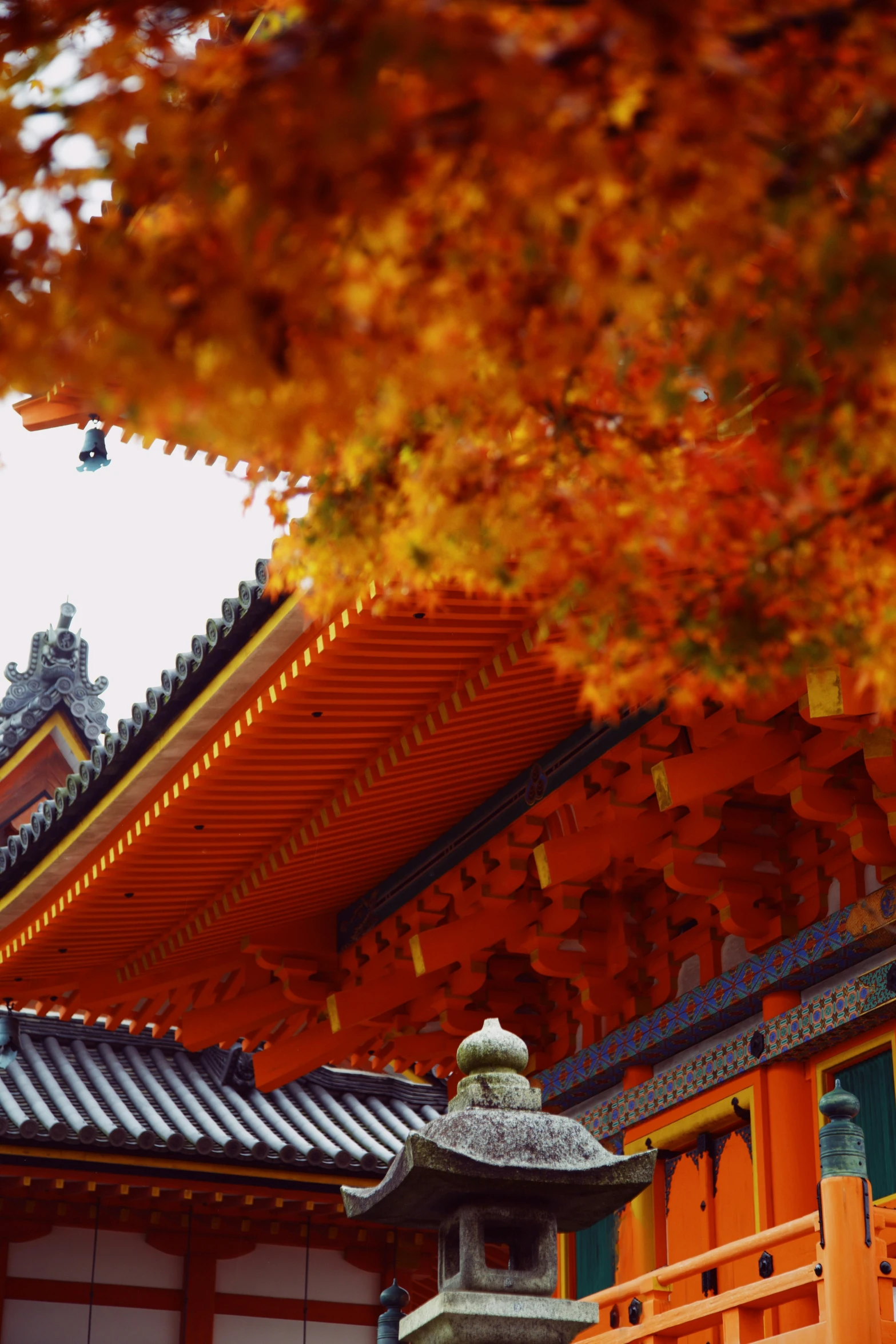 a beautiful orange building next to an old tower