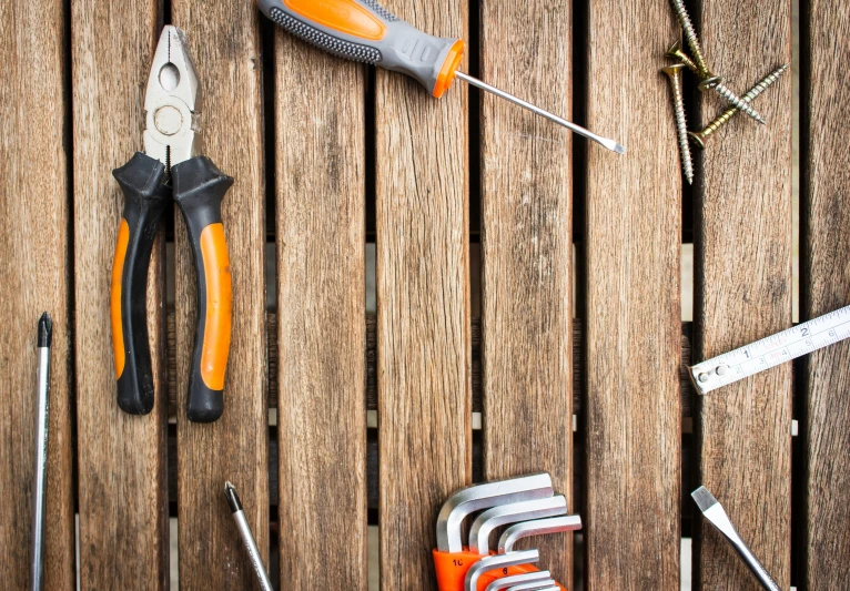 tools and materials sitting on a wooden table