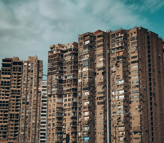 many brown buildings with lots of windows on them