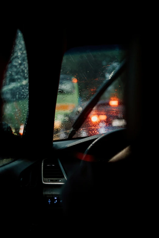 the night scene in the car as traffic travels along the street