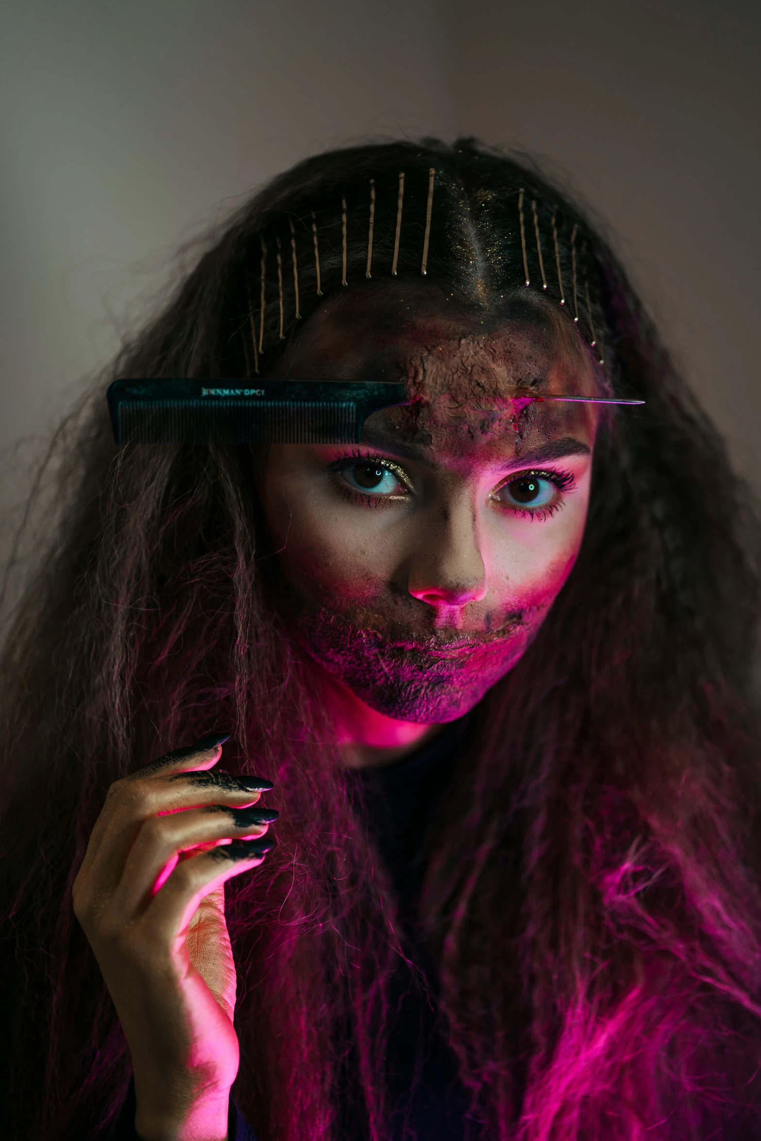 a woman has her long hair pulled up in different directions