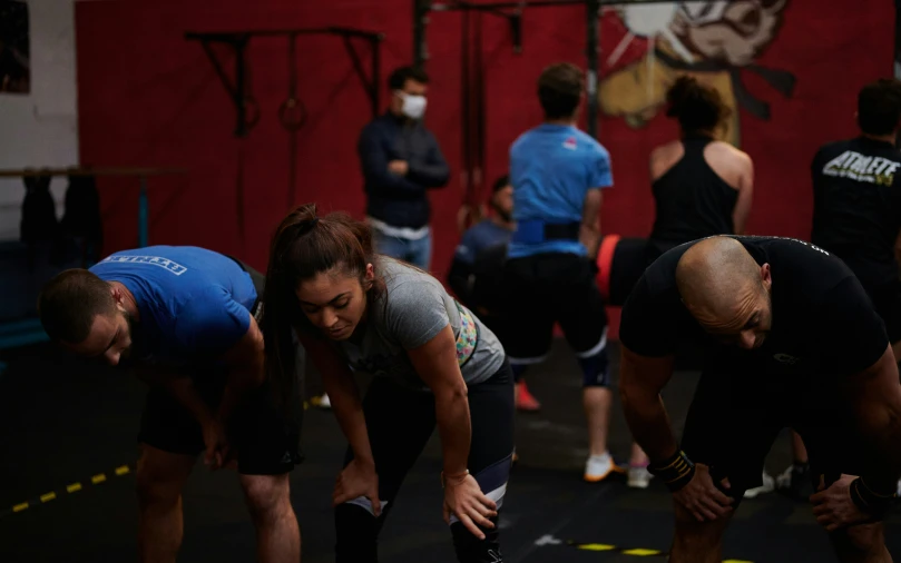 a group of people on a gym floor