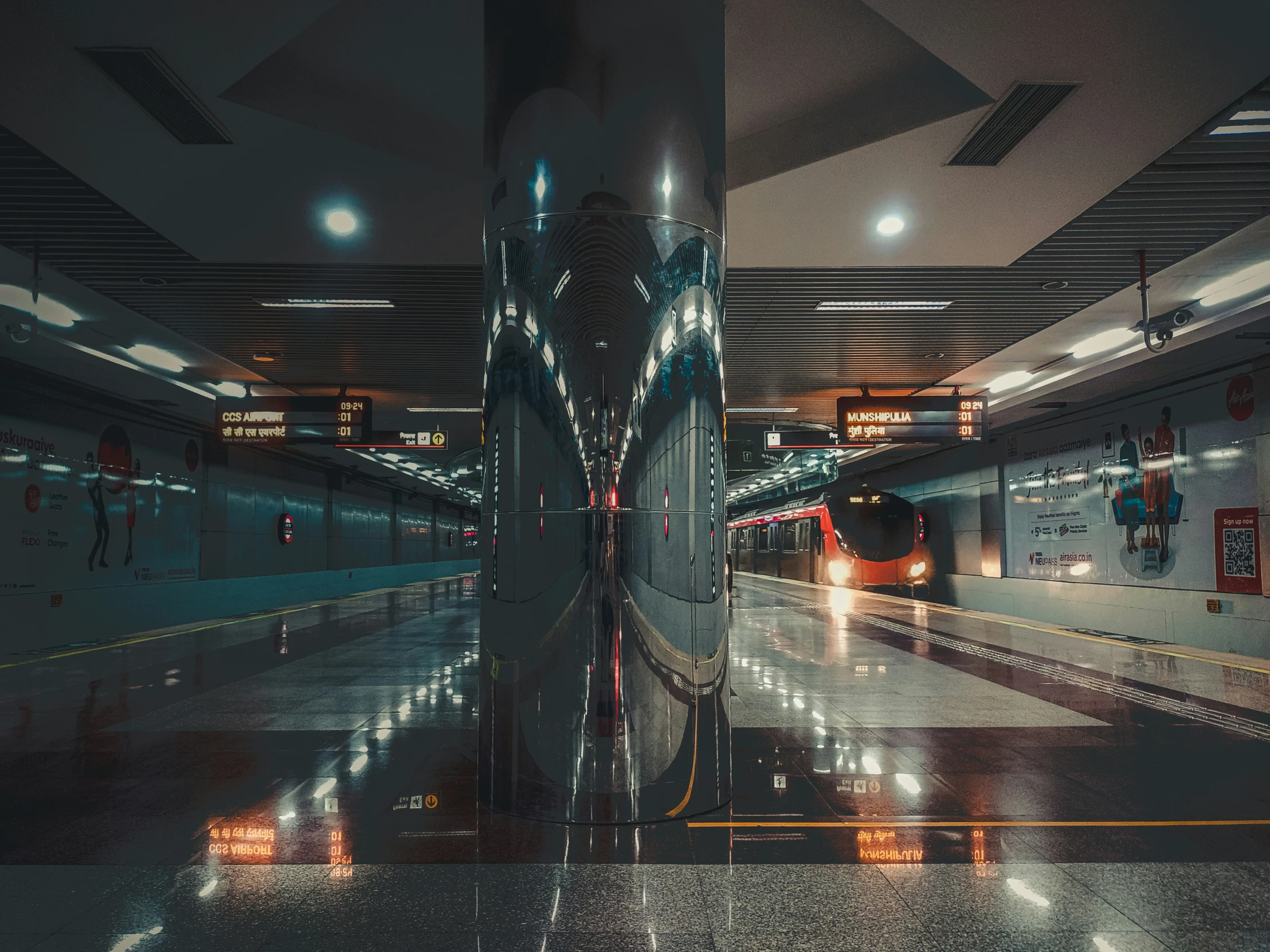 a reflection of a train is shown on the ground