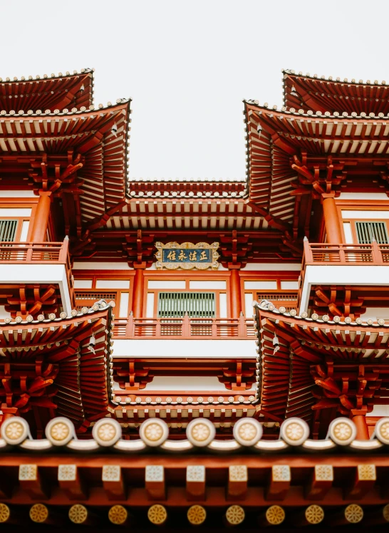 a red and white building with many windows