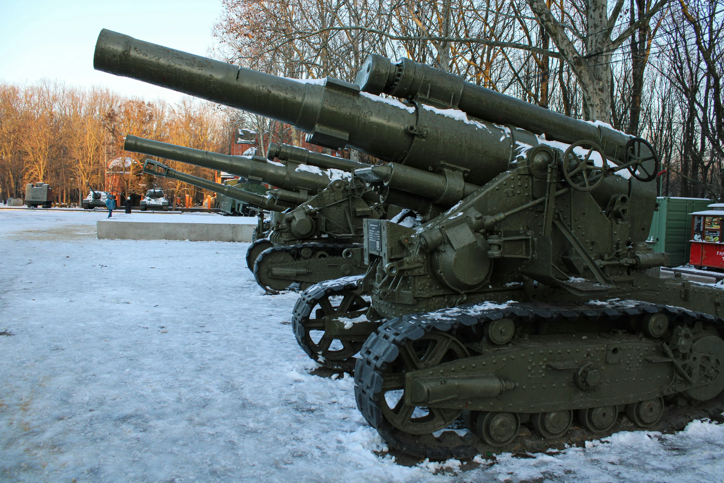 old military cannon with very large parts attached to the side