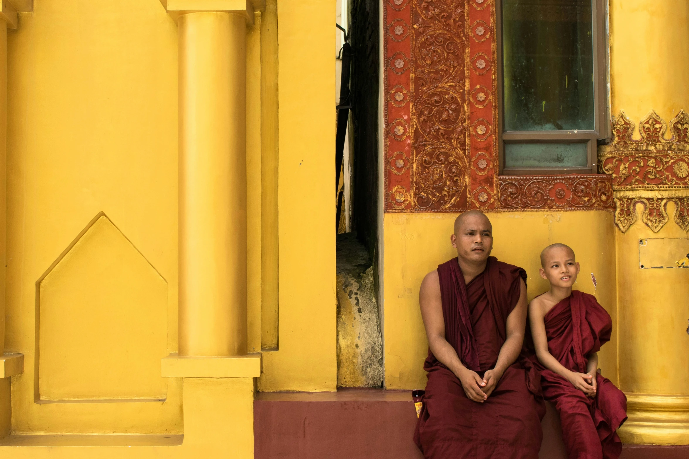 a man and woman sitting next to each other