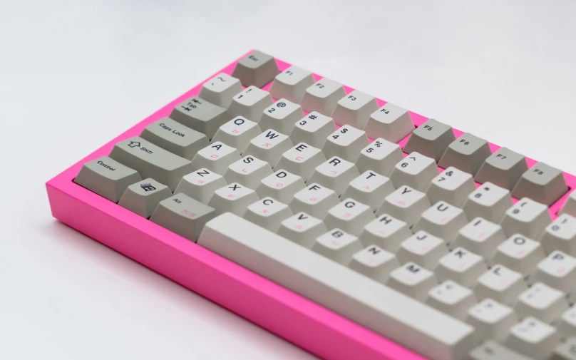 a colorful pink keyboard is seen here