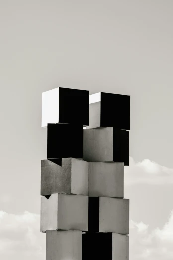 a tall statue that looks like a number of cubes