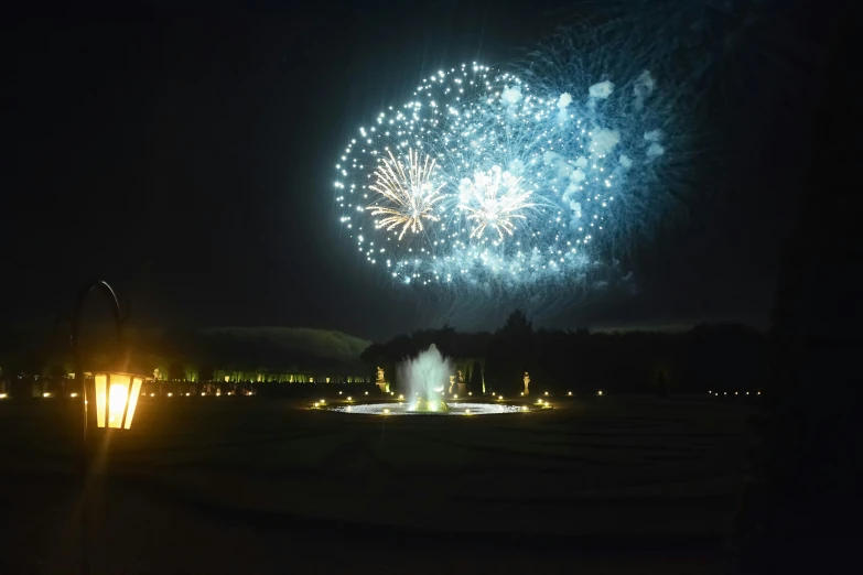 large fireworks in the sky with several lights on them