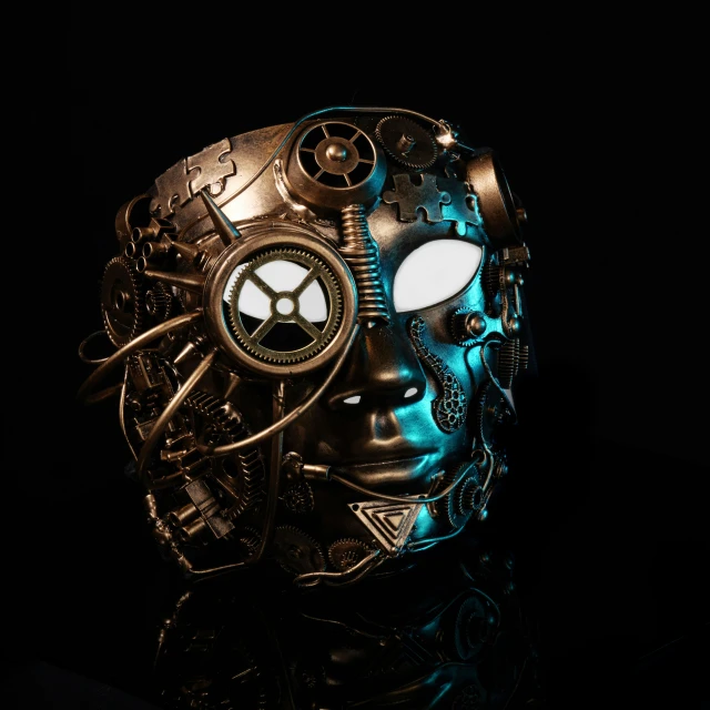 a metallic mask with gears on it in the dark