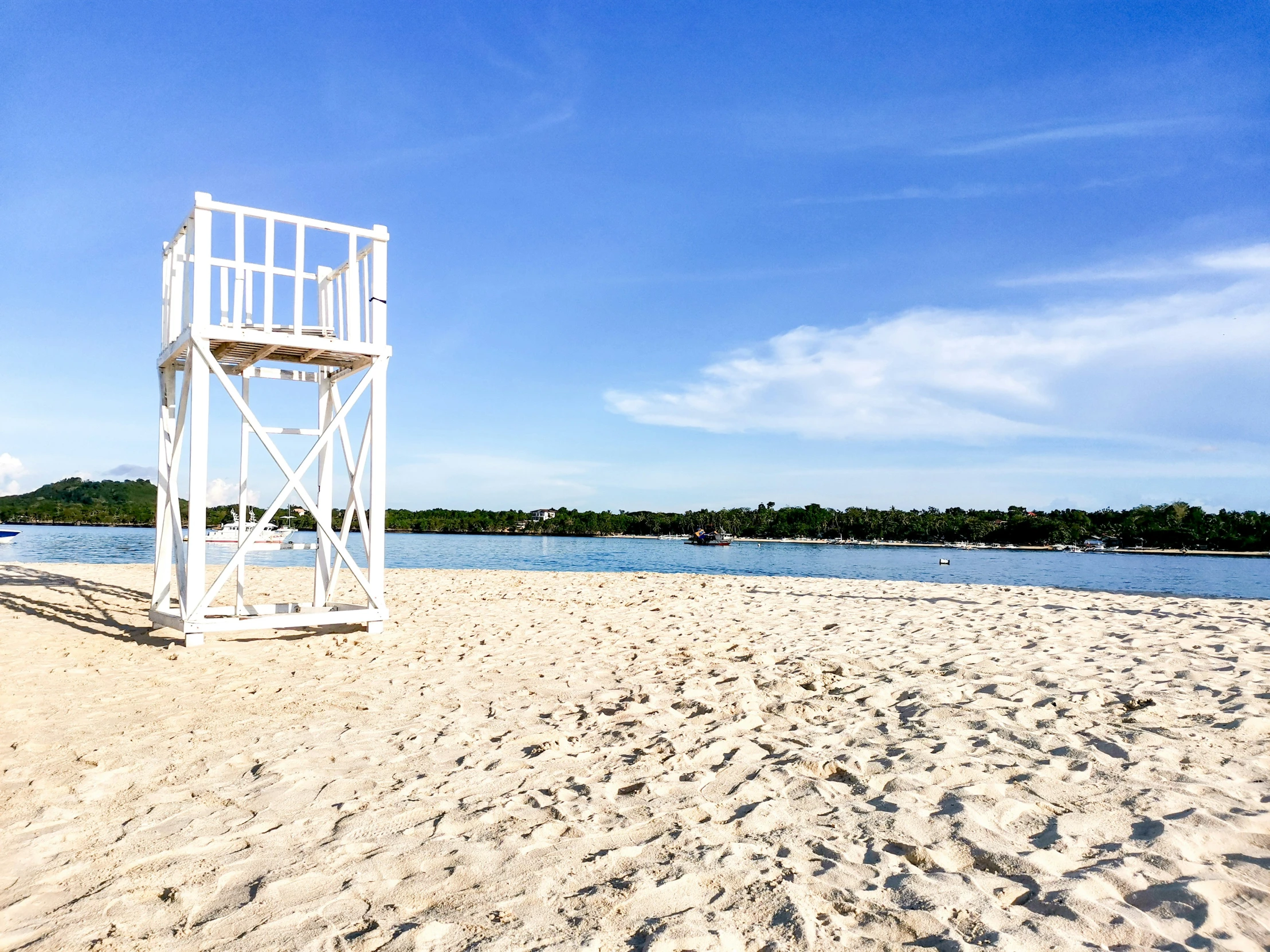 a life guard stand near a body of water