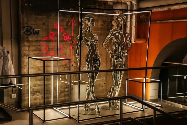 a display case that contains an assortment of mannequins