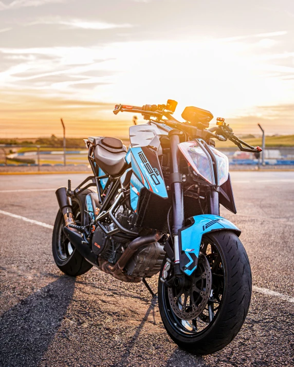 a motor bike sits in an empty lot