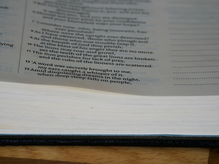 a close up of an open book with the text in it