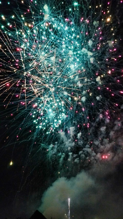 a fireworks with bright colors and bright lights