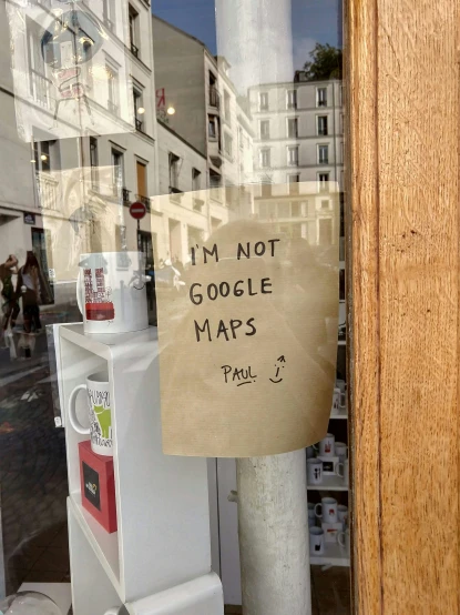 an image of a sign in a store window